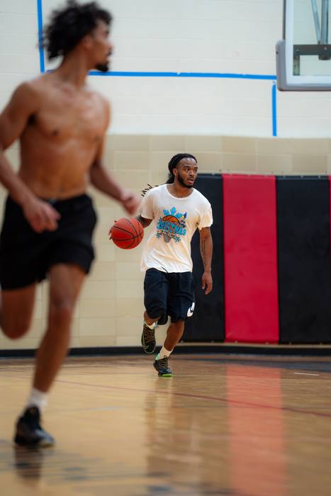 Guard pushing the ball up the court