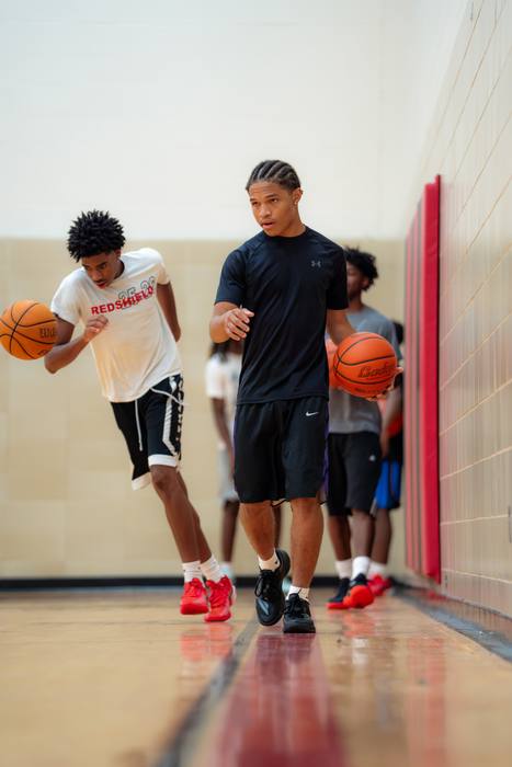 Players working through a ball-handling drill