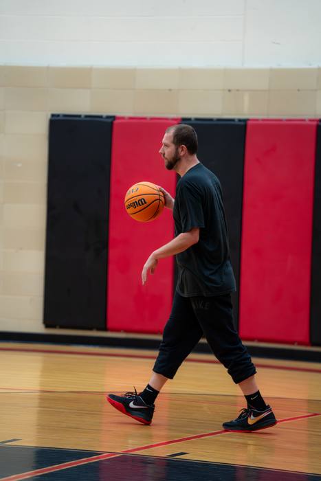 Coach running a dribbling demonstration