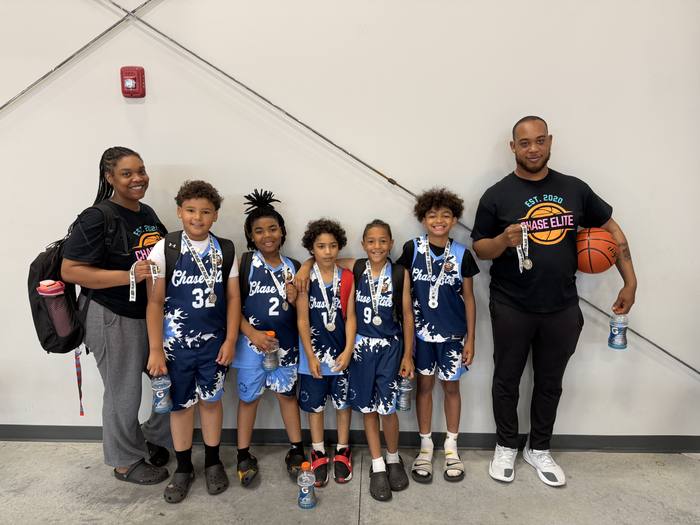 Chase Elite youth team with their coaches after a tournament