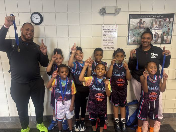 Young Chase Elite players celebrating with their medals